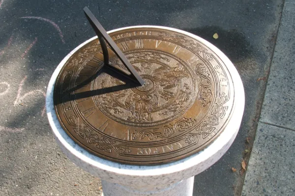 Bronze sundial on a granite pedestal