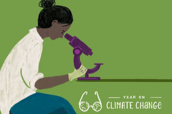 Scientist looking into microscope. Includes words Year on Climate Change