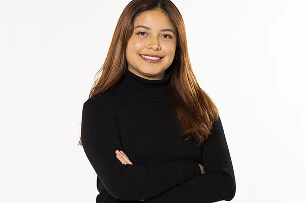 Diane Benitez ’22 standing with arms crossed