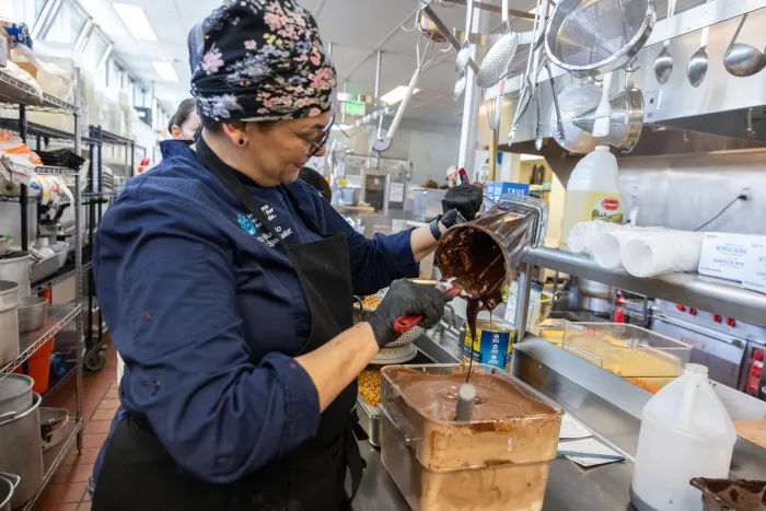 Chef Tracy Burgio begins assembling her dessert.