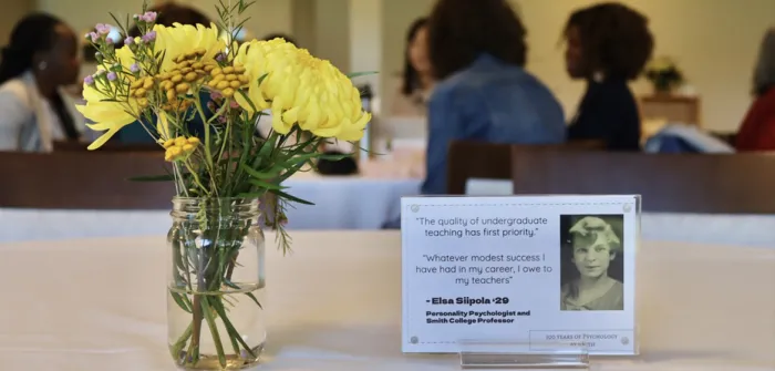 Table setting featuring quotes from Elsa Siipola '29