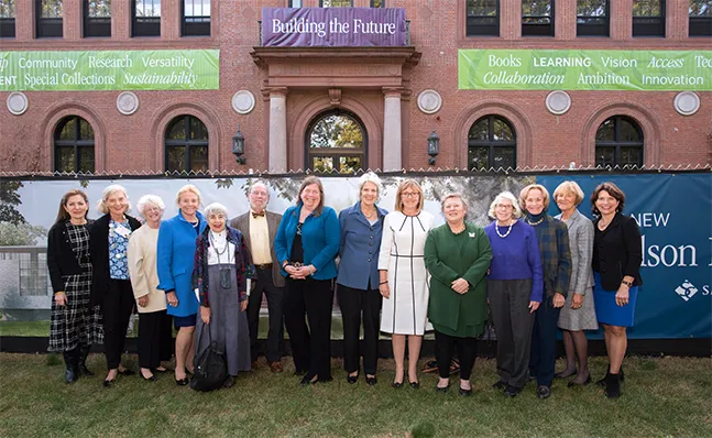 Group of people in line in front of Neilson Library