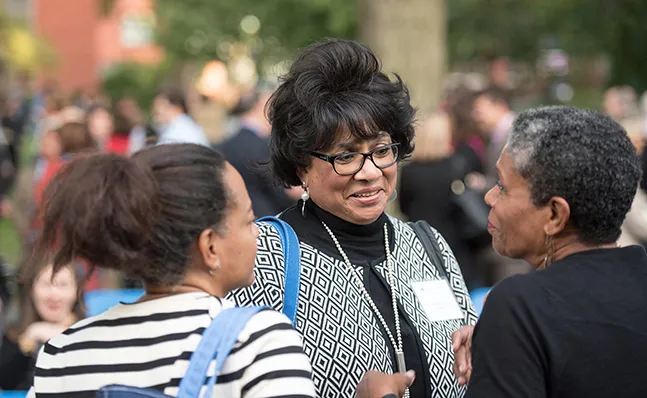 Three alumnae at the Neilson groundbreaking