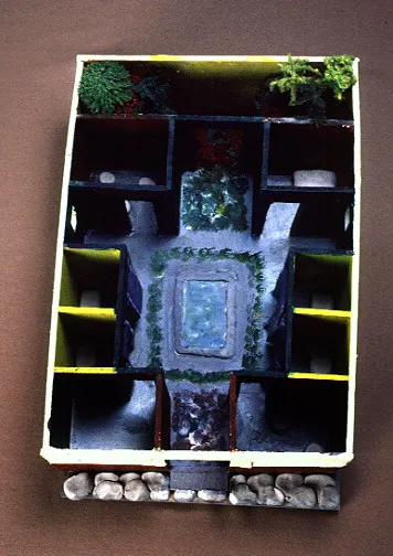 Overhead view of a model of an ancient Roman house. Central courtyard with a blue pool, surrounded by small rooms and greenery.