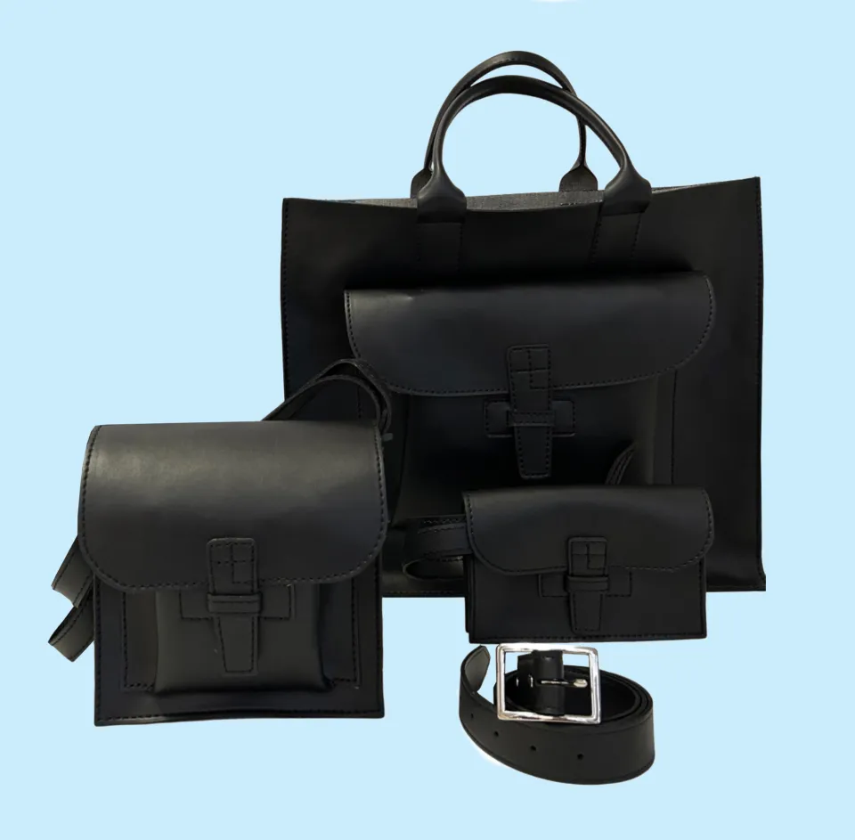 A series of black vegan leather products, five bags and one belt, from Agnes Baddoo, a Smith College alum