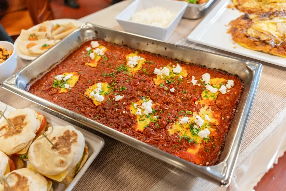 A tray of spicy chorizo shakshuka with Better 'n Eggs in tomato sauce 