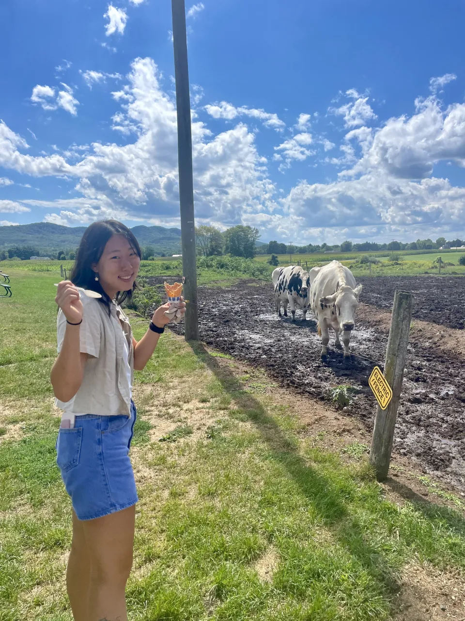  Reimy Liou ‘24 outside with cows