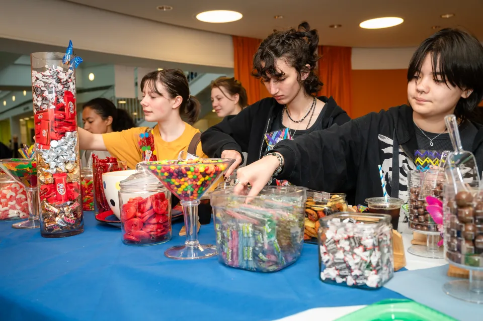 Students enjoy a candy bar