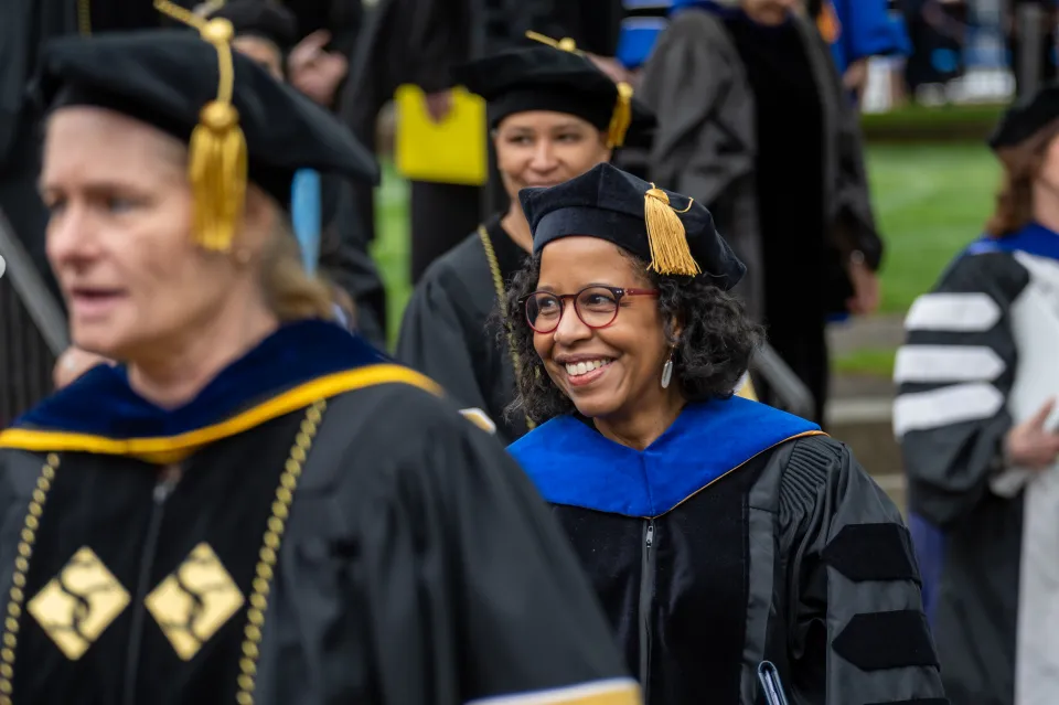 Provost Daphne Lamothe in doctoral robes and cap