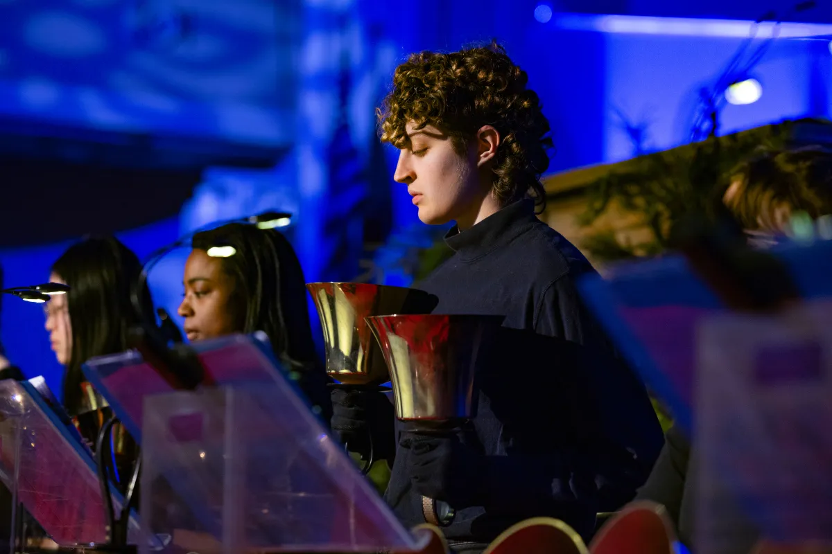 Students perform with the handbell choir during Vespers.
