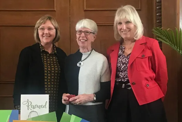Kathleen McCartney, Mary Grant and Susan Greene at an event on campus