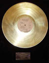 Framed gold record of I Am Woman by Helen Reddy (Capitol Records), 1972